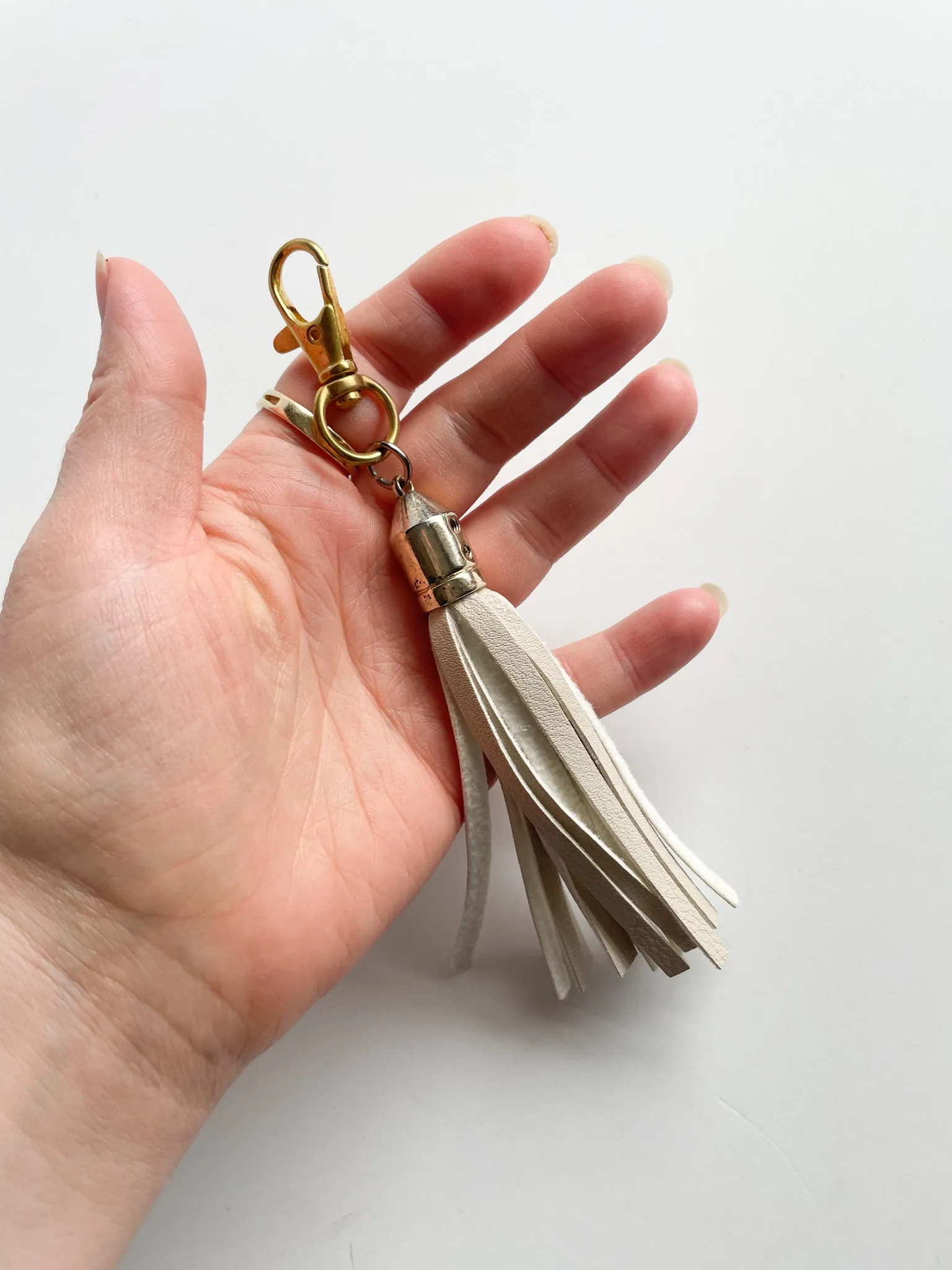 Cream Faux Leather Tassel Champagne Keychain Purse Dangle