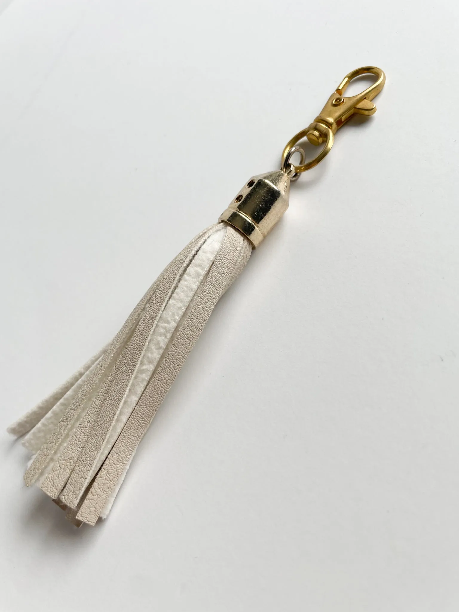 Cream Faux Leather Tassel Champagne Keychain Purse Dangle